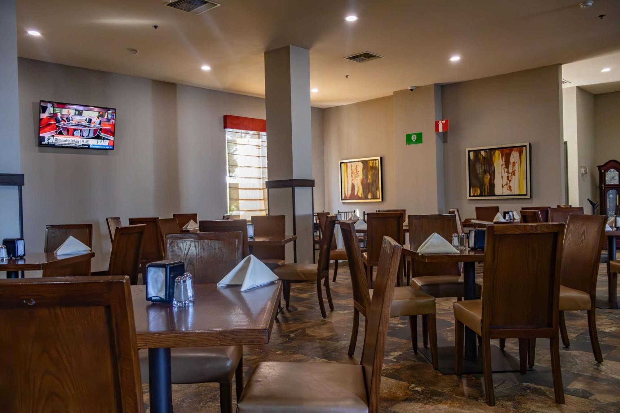 Best Western Premier Monterrey Aeropuerto Apodaca Exteriér fotografie The dining room at the restaurant